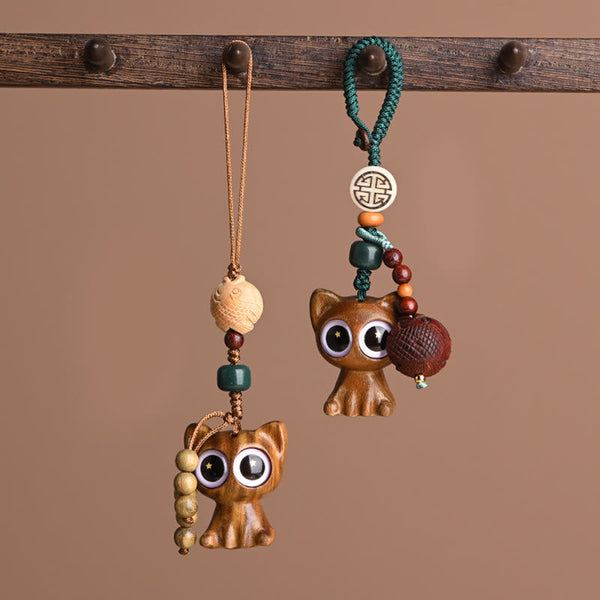 Green Sandalwood Phone Charm – 45-degree angle, lucky cat carving, koi fish detail