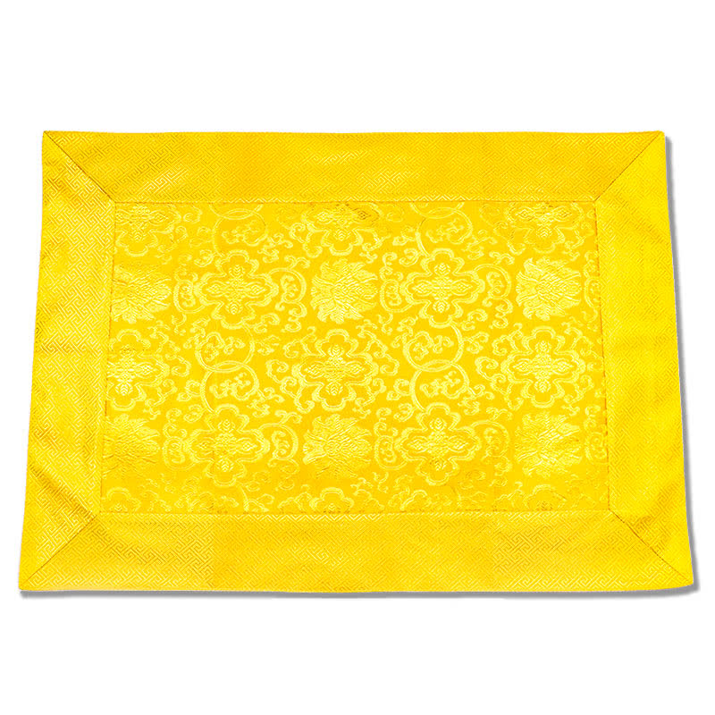 Tibetan Dragon Prayer Mat - Golden yellow brocade textile with woven lotus motifs and lattice border on white, Harmony