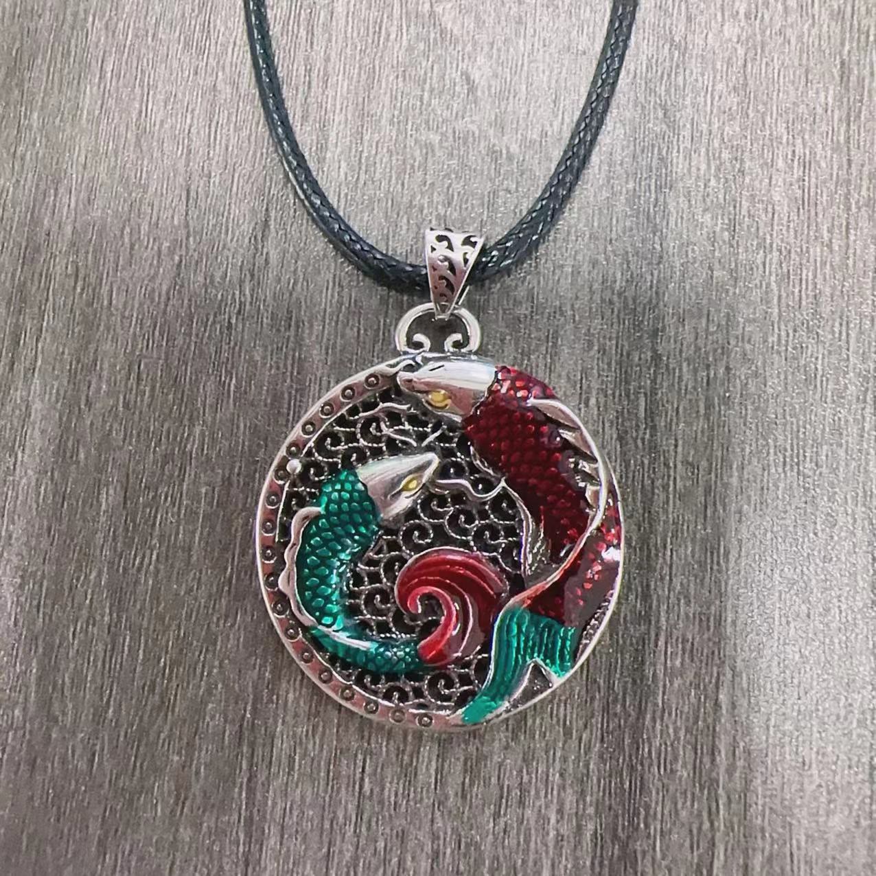 Tibetan Copper Koi Fish Healing Necklace – side angle showing pendant detail, copper finish
