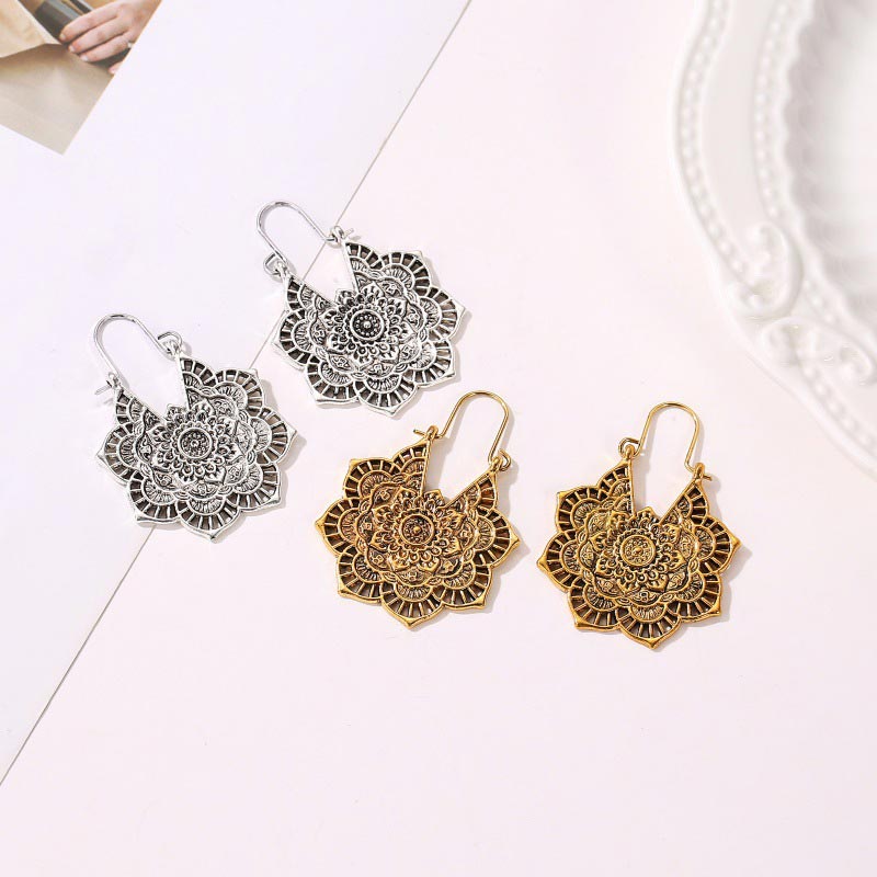 Tibetan Copper Lotus Engraving Drop Earrings – Two pairs of mandala drop earrings showing copper and silver finish variants with intricate filigree flower-of-life patterns