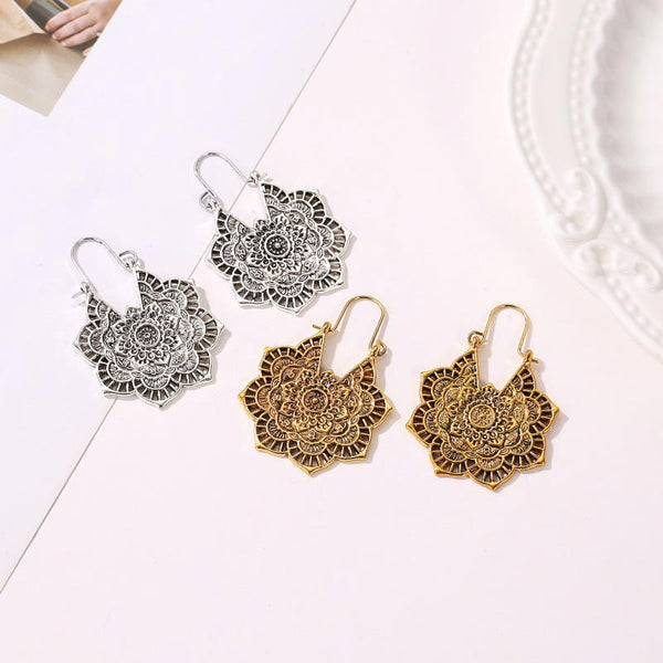 Tibetan Copper Lotus Engraving Drop Earrings – Two pairs of mandala drop earrings showing copper and silver finish variants with intricate filigree flower-of-life patterns