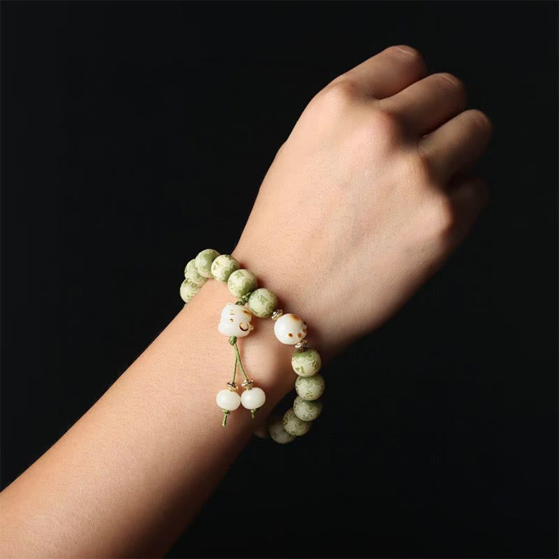 Pulsera Om Mani Padme Hum con diseño de pata de gato y semillas de Bodhi verdes Imagen secundaria del producto