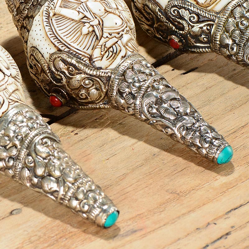 Engraved Shankha Positive Conch – macro of robe fold engraving patterns, textile texture in stone craft