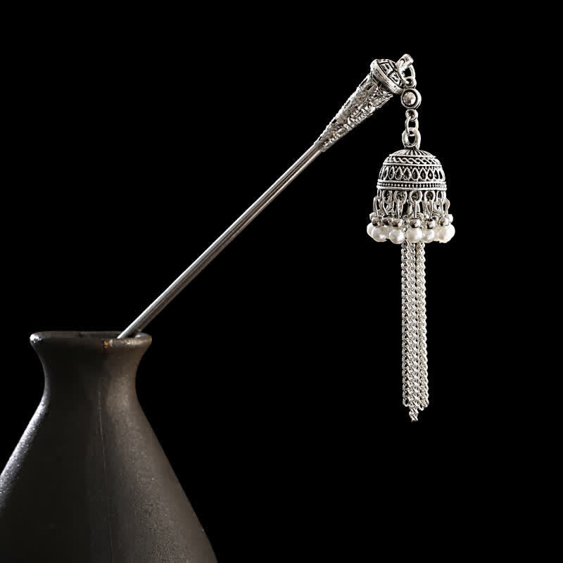 Bell variant cylindrical bell with pearl rim and chain tassel