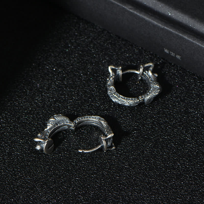 Sterling Silver Dragon Hoop Earrings – textured exterior and smooth interior with visible hinge clasp, vintage oxidized si...