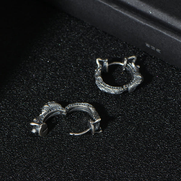 Sterling Silver Dragon Hoop Earrings – textured exterior and smooth interior with visible hinge clasp, vintage oxidized si...
