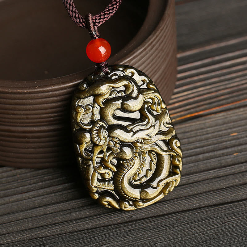Gold Sheen Obsidian Dragon Pendant – Three-quarter view highlighting chatoyant golden sheen on carved relief, luxurious