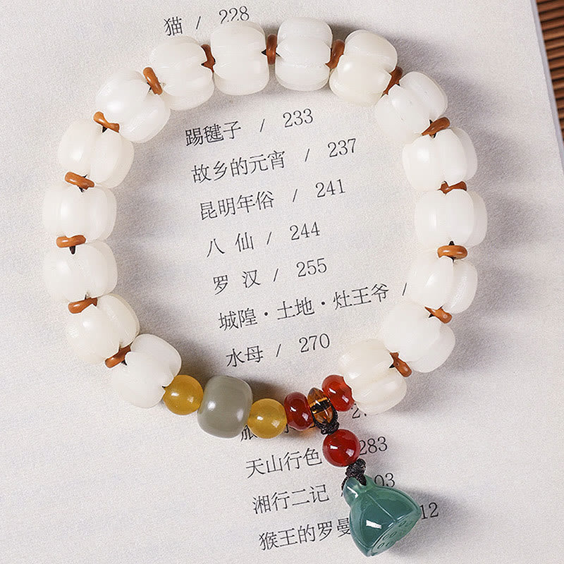 Bodhi Seed Lotus Bead Bracelet - lotus bead arrangement on classic Chinese text, artisan