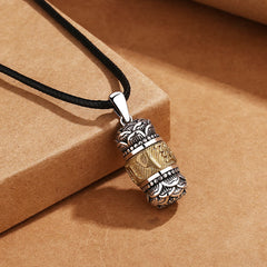 Om Mani Padme Hum Pendant – Three-quarter view on leather cord with lotus caps, Tibetan jewelry