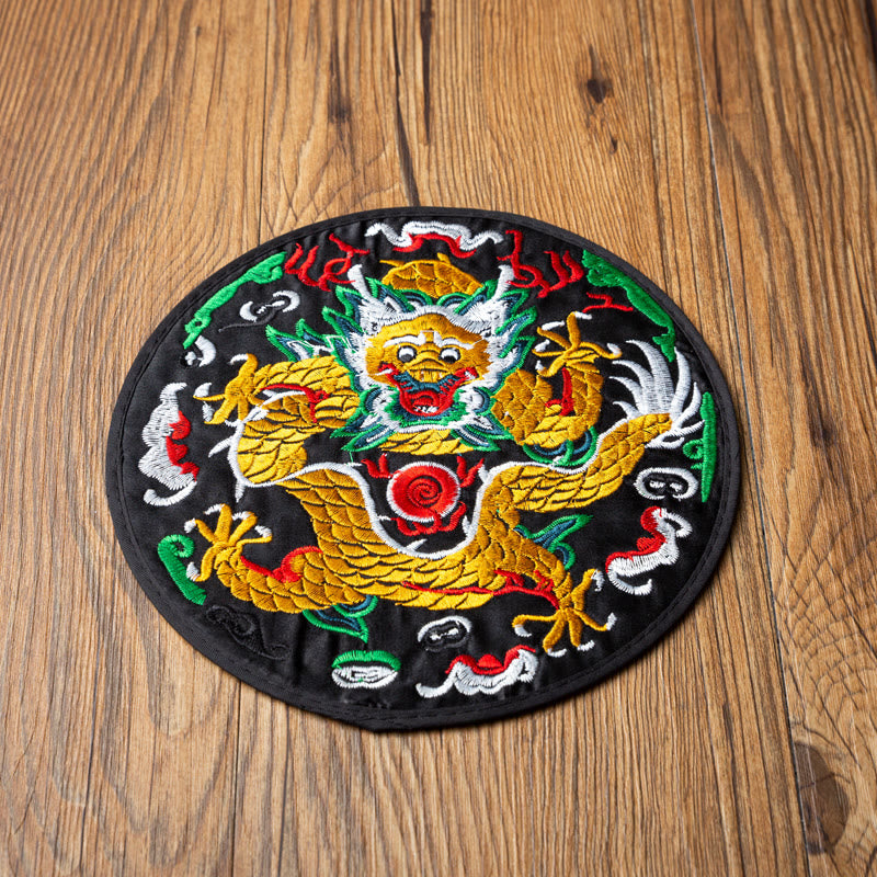 Dragon Embroidery Tea Cup Coaster Mat - black base golden dragon overhead on wood, high-contrast imperial style
