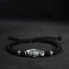 999 Silver Koi Fish Red String Bracelet – close-up of silver koi fish pendant detail, handmade amulet