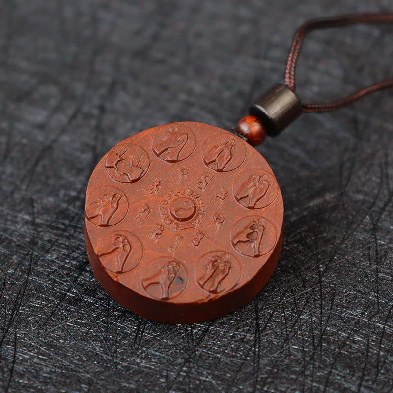 Lightning Struck Jujube Wood Pendant – Round reddish-brown wooden amulet with yin-yang symbol, eight mudra carvings and Chine