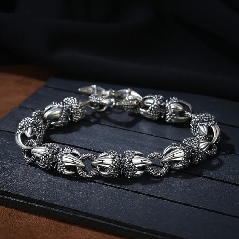 Dragon Claw Engraved Strength Protection Bracelet – Antiqued silver talon links on dark wood, gothic statement, Bold