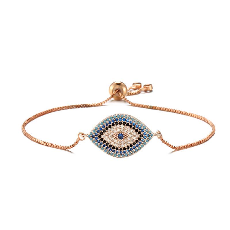 Evil Eye Healing Bracelet – Rose gold adjustable evil eye bracelet with slider clasp on white background