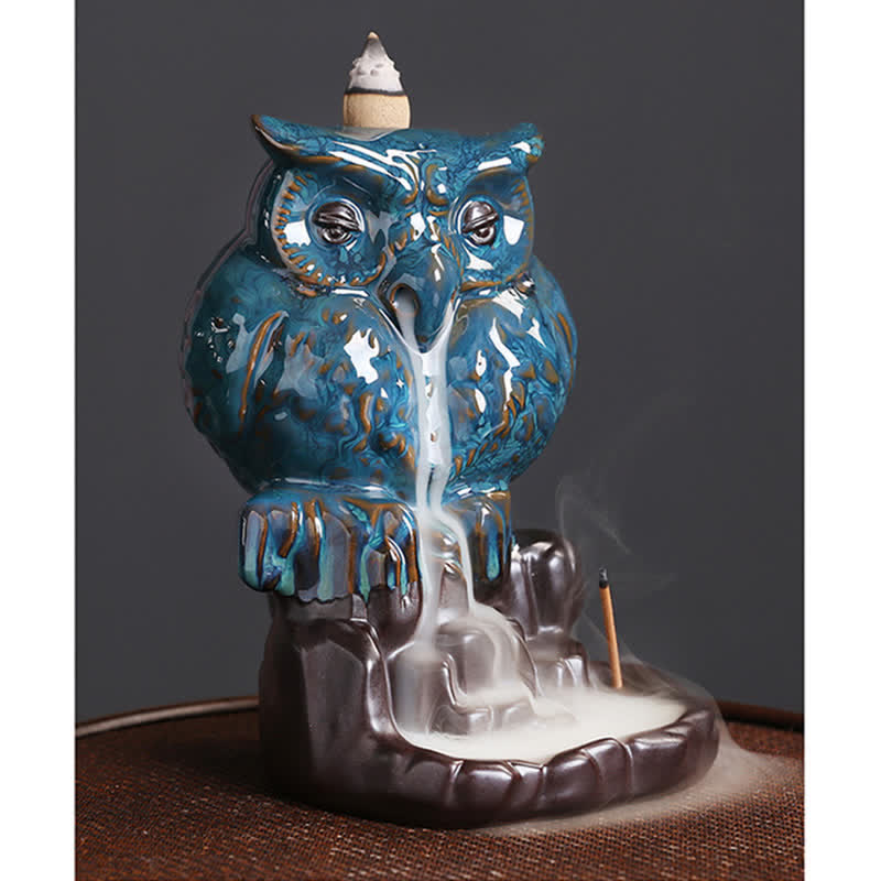 Owl Ceramic Backflow Incense Burner - smoke pouring from beak over rocks, tranquil
