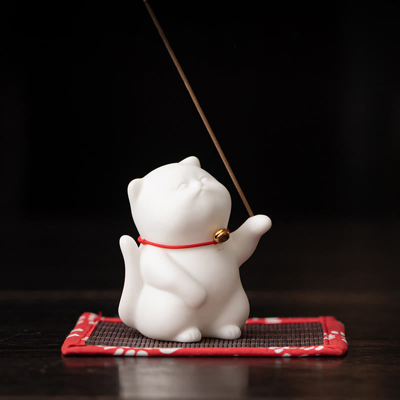 Mini Cute Cat Ceramic Incense Burner – Side view of white cat figurine on woven mat with incense stick, meditation decor