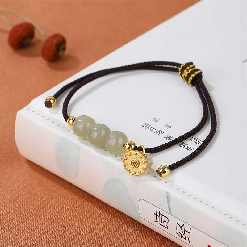 Hetian Jade Lotus Pod Braided Bracelet – black cord with jade beads on poetry book, cultural