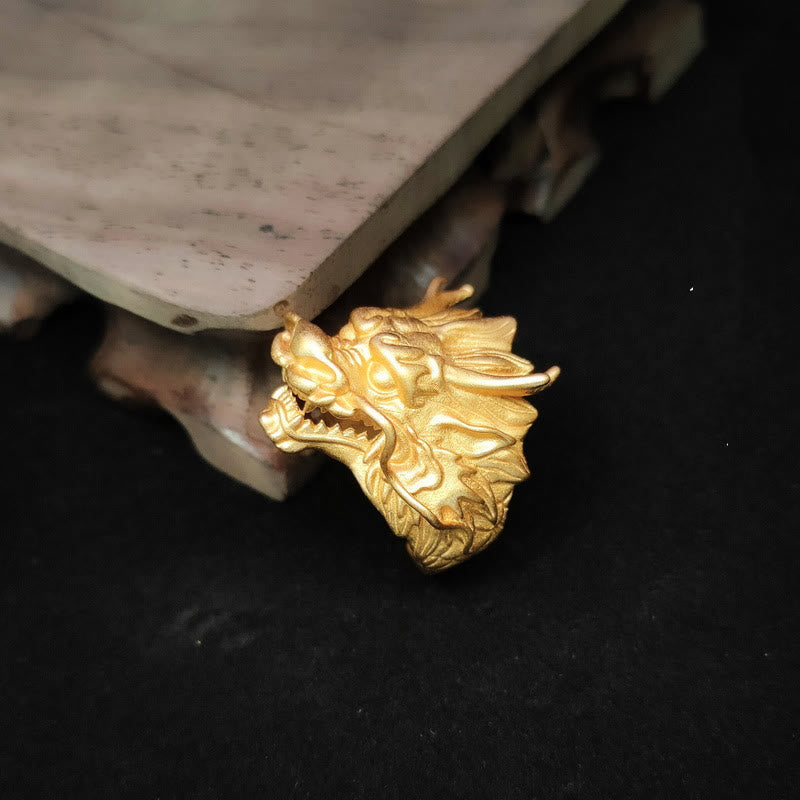 Golden Dragon Luck Protection Ring – low-angle view highlighting dramatic horns and scaled armor texture