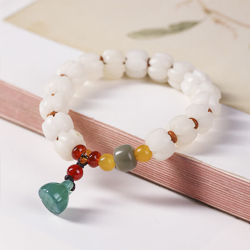 Bodhi Seed Lotus Bead Bracelet - white lotus beads with colored accents, mindful living