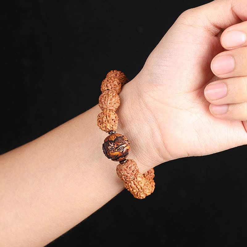 Rudraksha PiXiu Bracelet – Worn on wrist against black background, casual everyday wear shot