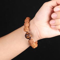 Rudraksha PiXiu Bracelet – Worn on wrist against black background, casual everyday wear shot
