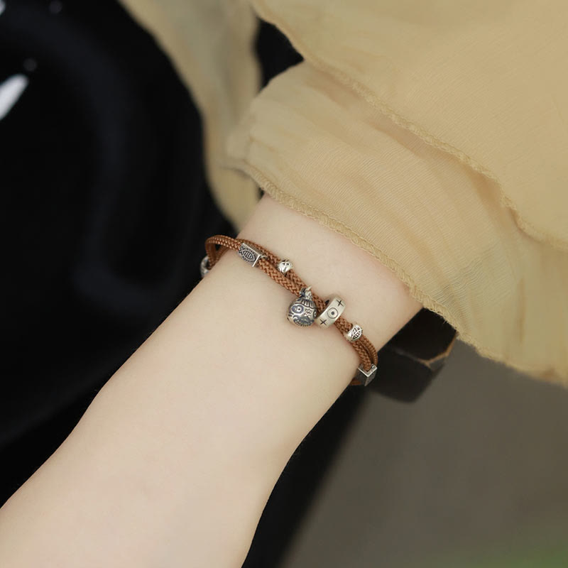 Silver Gold Koi Pixiu Bracelet - charm assembly showing beast and koi connected