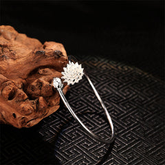 White Copper Lotus Enlightenment Bangle - cuff on weathered wood, dark pattern, awakened