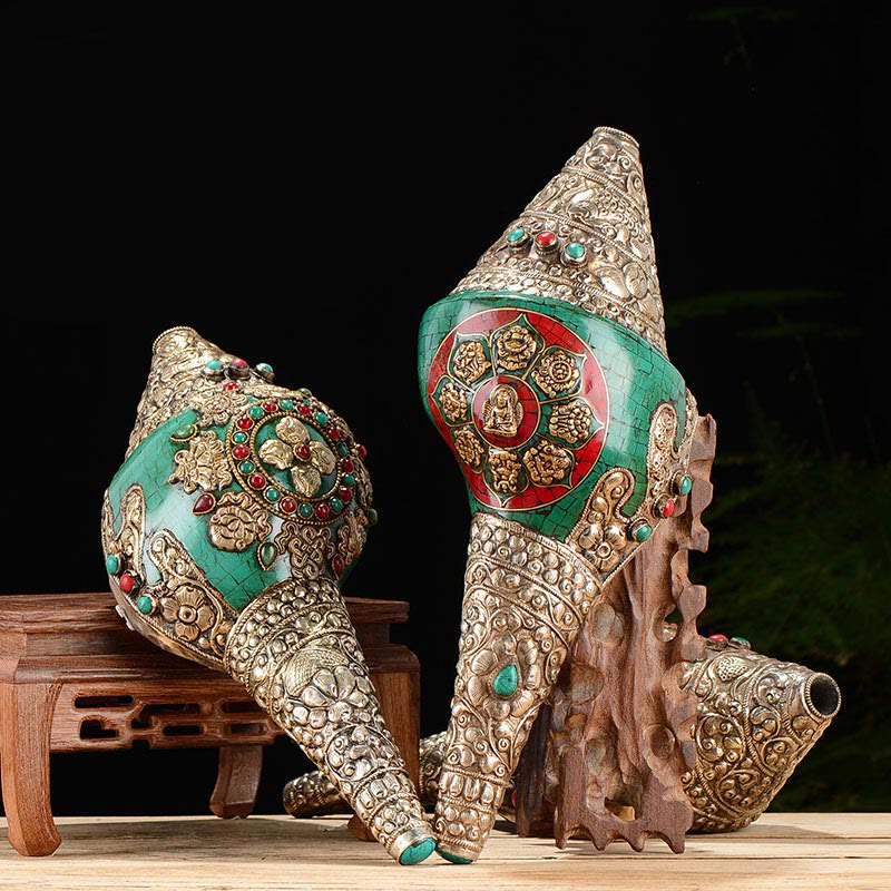 Double Dorje Shankha Conch – side angle showing double dorje prongs wrapping shell curve, vajra craft