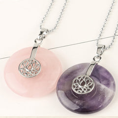 Crystal Amethyst Pink Crystal Lotus Necklace – Rose quartz and amethyst lotus donut pendants stacked, soft studio lighting, chakra healing