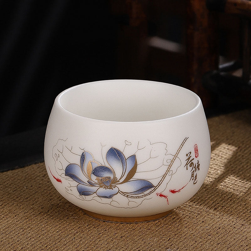 Dragon Cicada Ceramic Tea Bowl - blue lotus with red koi fish and Chinese calligraphy, gold petals on cream ceramic