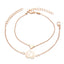 Lotus Heart Enlightenment Bracelet - Two gold layered bracelets with lotus and heart charms on white, love bracelet
