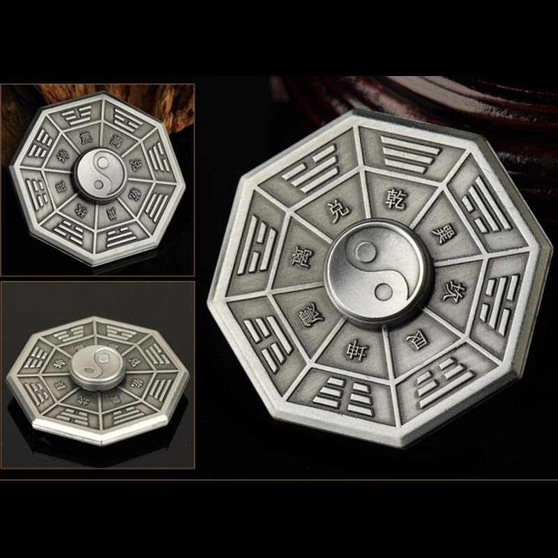 Silver Bagua Pendant - yin-yang and I Ching trigrams octagonal amulet, multiple angles on dark background