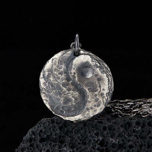 Sterling Silver Yin Yang Necklace – Hammered texture pendant on oxidized chain, volcanic rock display