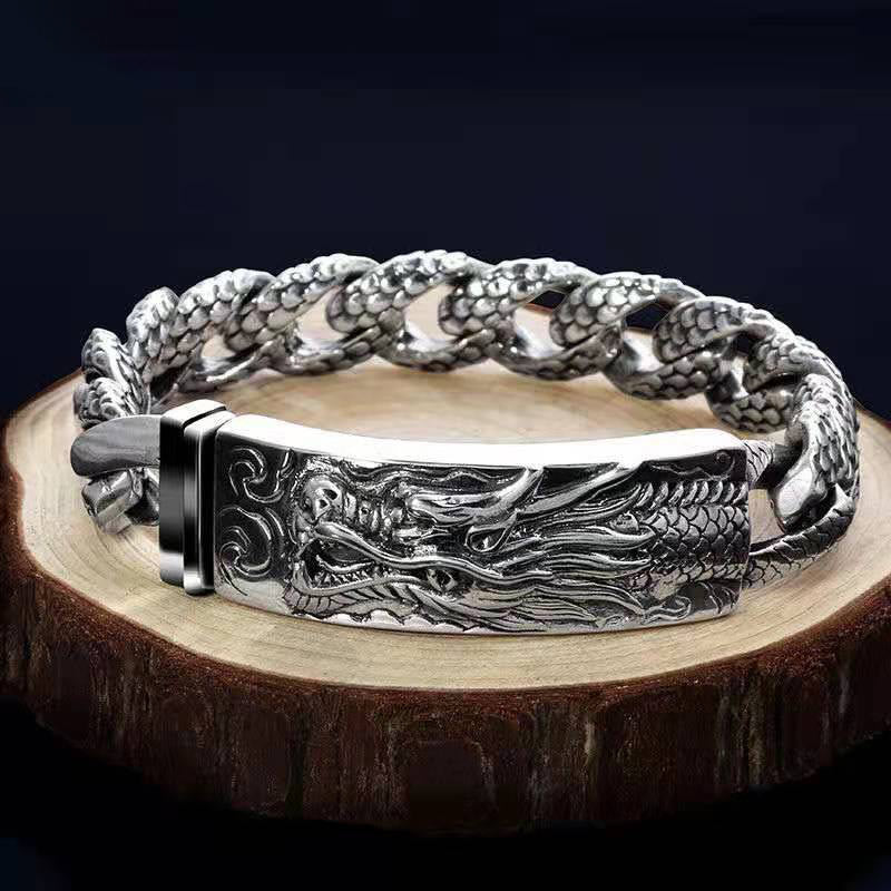Dragon Scale Bracelet - relief plaque on wood slice with blue backdrop, mythical