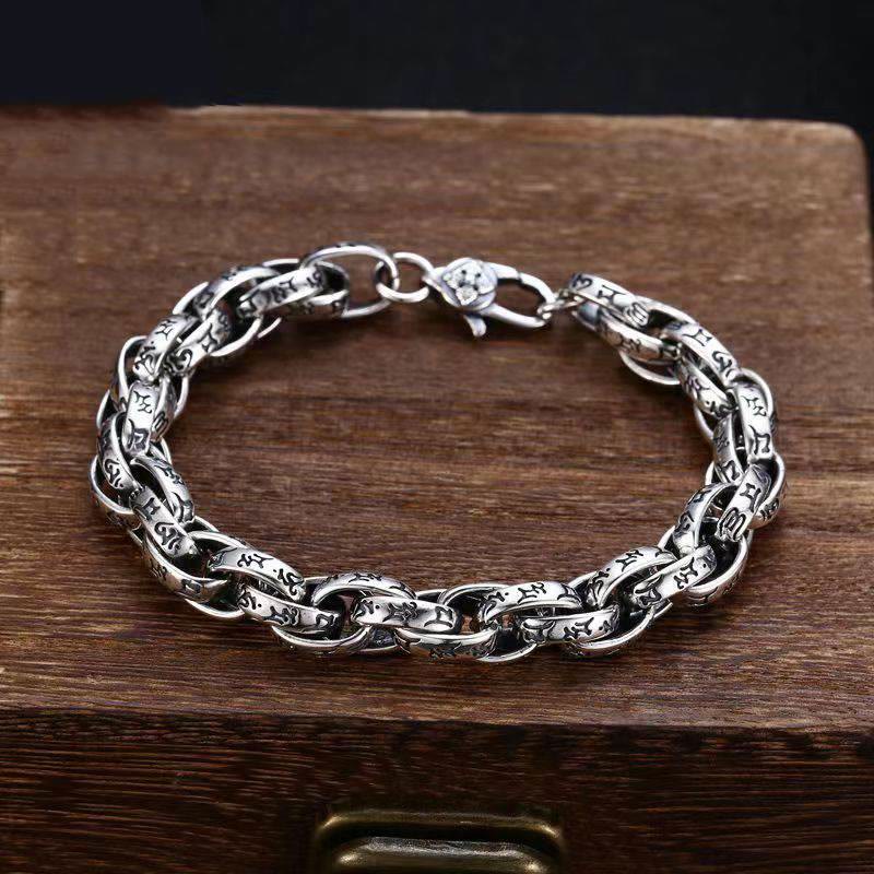 Tibetan Om Mani Padme Hum Copper Bracelet – flat lay view showing engraved oval chain links, silver jewelry