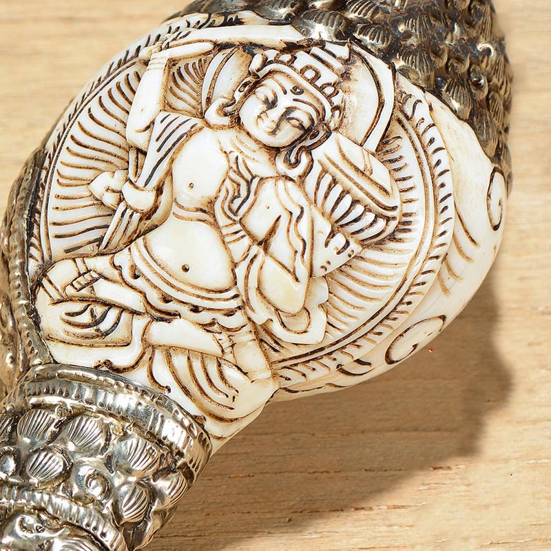 Engraved Shankha Positive Conch – held in both hands at temple offering height, devotional practice pose