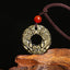 Peace Buckle PiXiu Necklace – Gold sheen obsidian carved PiXiu disc with red bead on purple rope, wood display