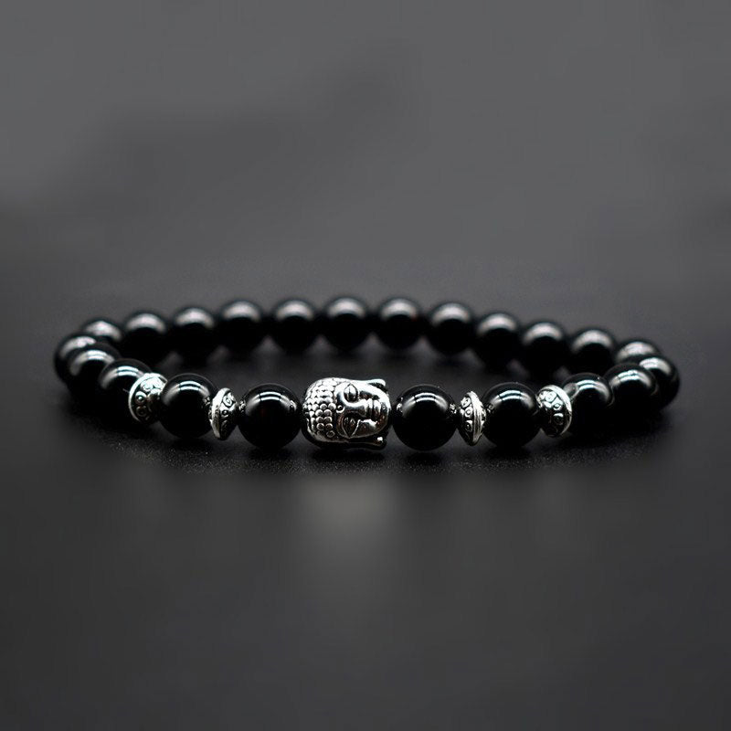 Amethyst Buddha Bracelet – Studio dark background shot of black onyx beads with Buddha, strength