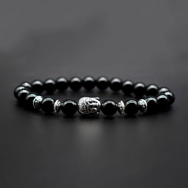 Amethyst Buddha Bracelet – Studio dark background shot of black onyx beads with Buddha, strength