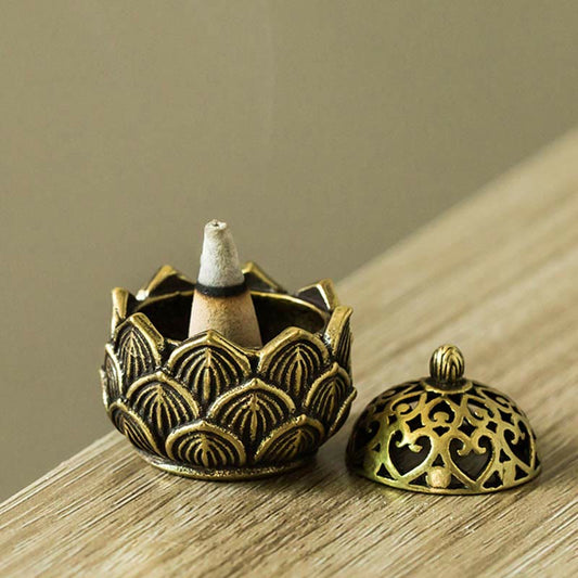 Tibetan Lotus Copper Mini Incense Burner – Lotus bowl with pierced lid beside, cone on petals
