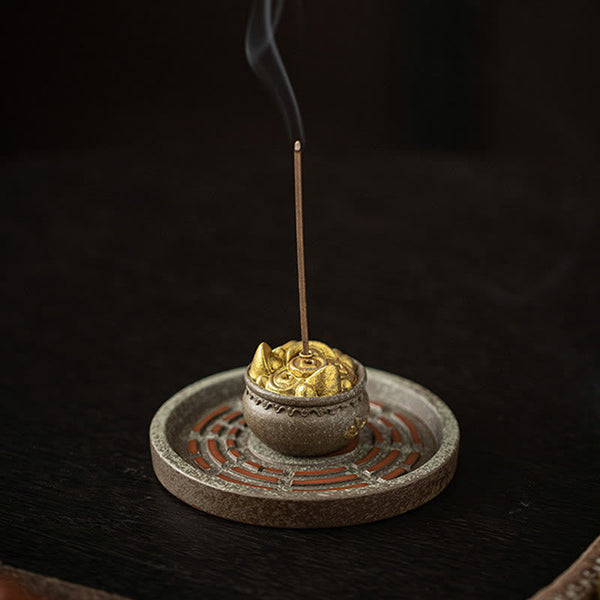 Ceramic Incense Holder – Gold lotus top on textured stone base with bagua pattern, incense smoking