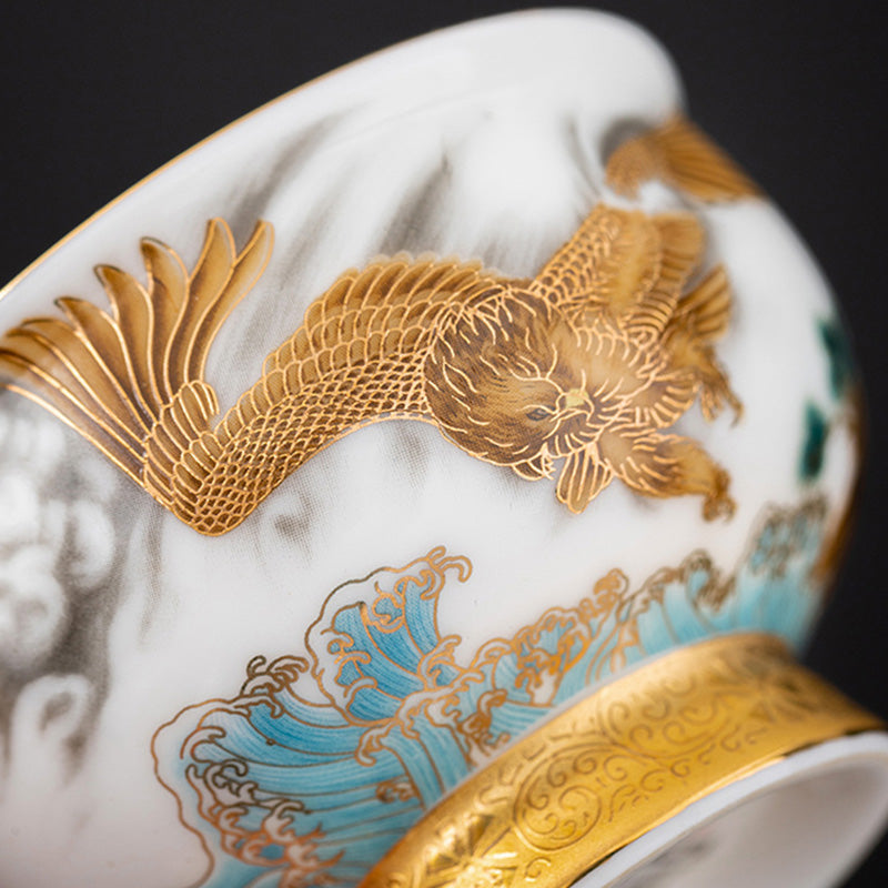 Golden Eagle Dragon Gilt Ceramic Teacup – raised gold koi fish relief with turquoise waves and ornate gold band, macro detail