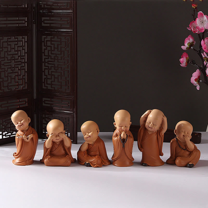 Mini Praying Monk Decor – row of identical monks in production finish check, quality consistency