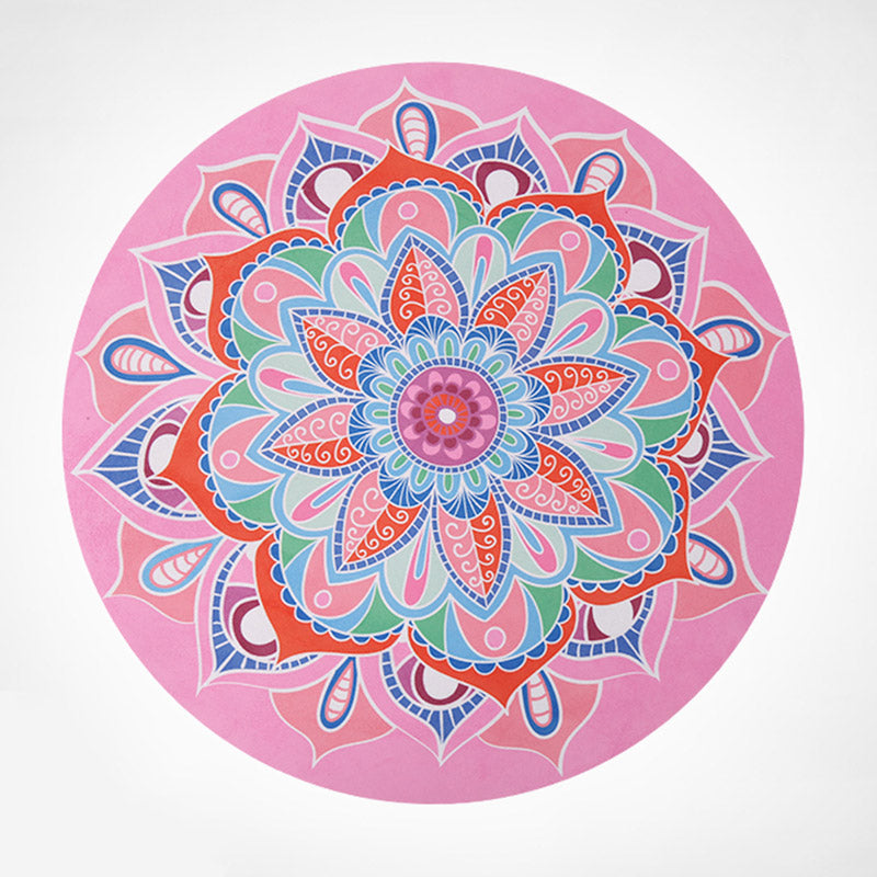 Lotus Mandala Yoga Mat – Round pink mat with colorful coral and green mandala flower, white scroll patterns
