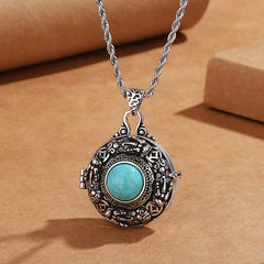 Tibetan Pi Xiu Necklace – Antique silver Pi Xiu locket with turquoise, braided chain