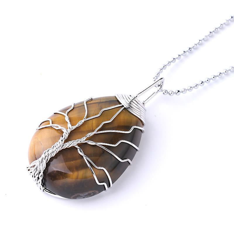 Quartz Crystal Tree of Life Necklace – tiger eye pendant, silver wire tree, three-quarter, grounding protection
