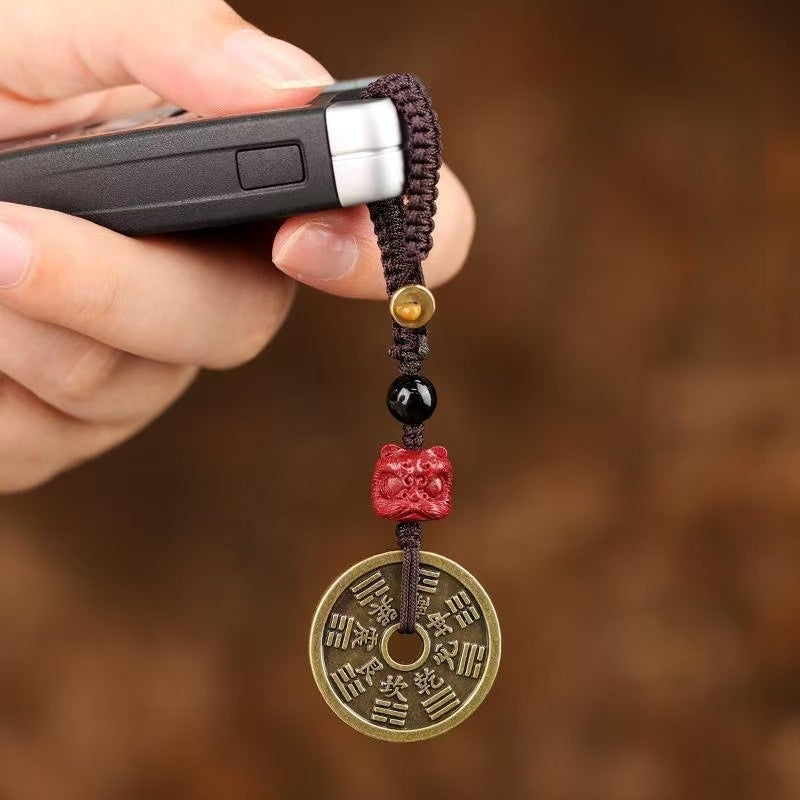 Cinnabar Bagua Mountain Ghost keychain with red cinnabar beast bead and Bagua coin on car key