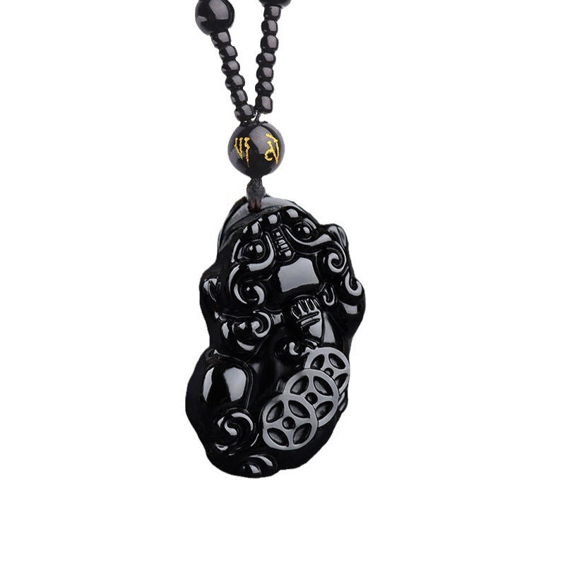 Obsidian Pixiu Necklace – Isolated obsidian pixiu pendant with bead chain on white, feng shui wealth amulet