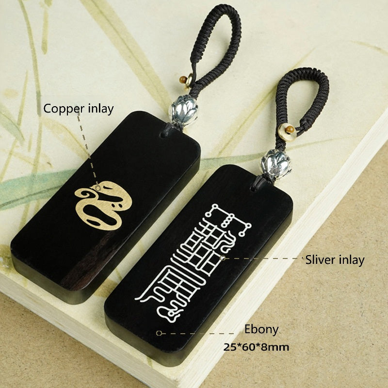 Ebony Big Dipper zodiac keychain with silver inlay Rabbit symbol and celestial script