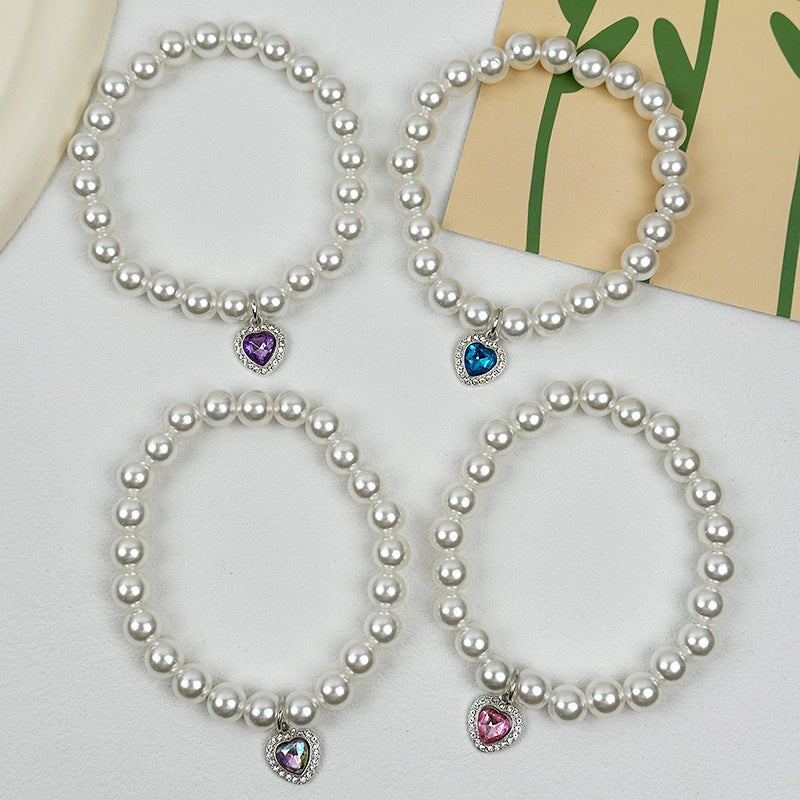Quartz Heart Pearl Pet Collar – Four pearl collars with multicolor hearts arranged square, pet jewelry set